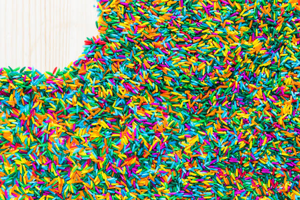istock Left Copyspace on colorful rice on wooden background 1041209972