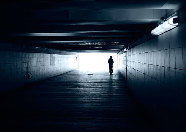 istock Lonely silhouette in a subway tunnel 104121116