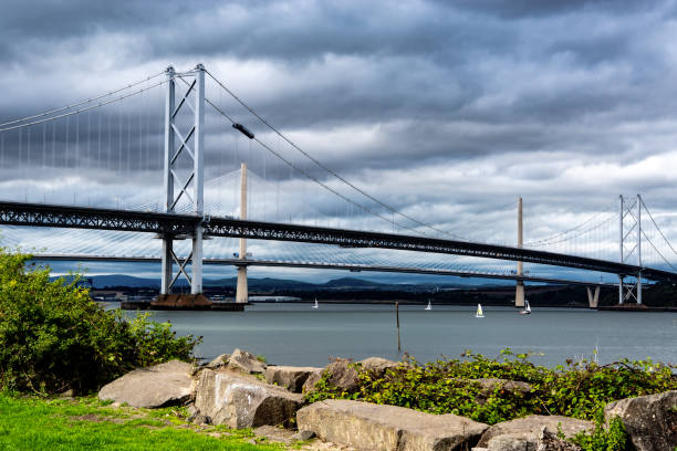 istock Two bridges over Firth of Forth (Queensferry Crossing and Forth Road Bridge) 1041213354