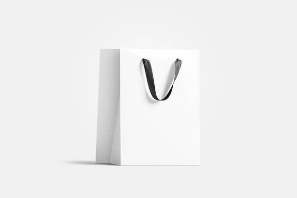 пустой белый бумажный подарочный мешок с черным шелковым макетом ручки, - shopping bag black bag paper bag стоковые фото и изображения