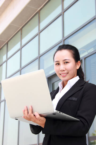 istock Asian businesswoman using laptop 1041236320