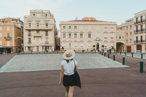 Young Caucasian woman walking in Monte Carlo, Monaco