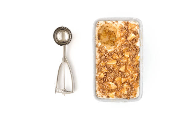 istock Apple Ice Cream in Container and Ice Cream Scoop 1041237326