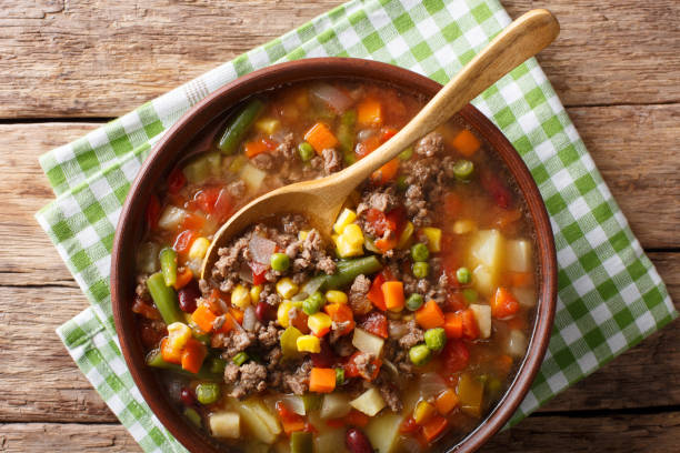 istock hamburger soup with ground beef and vegetables close-up in a bowl. Horizontal top view 1041250524