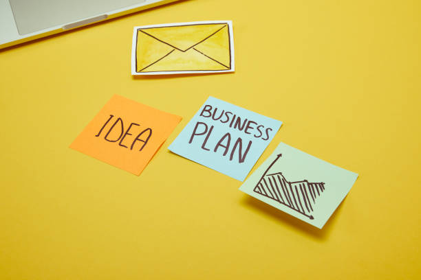istock paper stickers with words, idea and business plan on yellow surface 1041260162