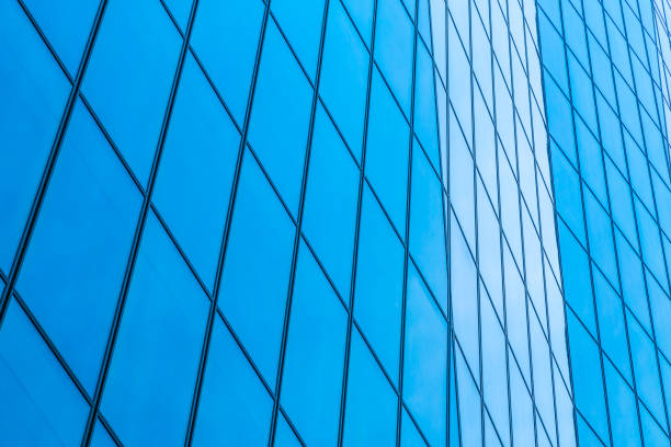 istock Low Angle View Of Modern Building Against Clear Blue Sky 1041270552