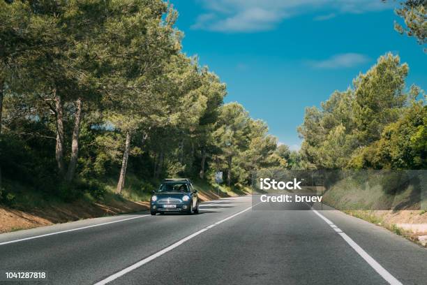 Blue Colour Mini Hatch Second Generation Driving In Motor Stock Photo - Download Image Now