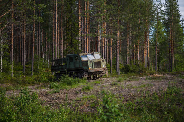 Old soviet artillery tractor by the woods at Suomussalmi in Finland