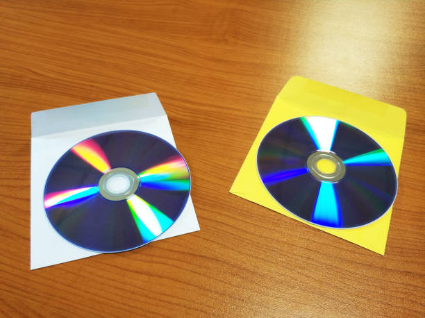 istock CD/DVD with paper case on desk 1041317844