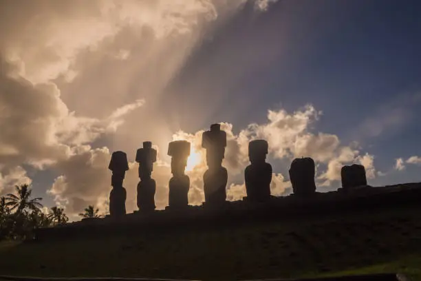 Silhouette of the moais of Ahu Nau Nau in Easter Island. Anakena Beach in Rapanui, Chile