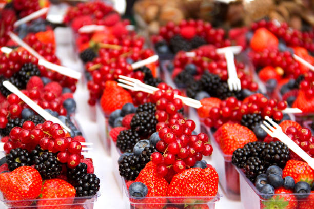 istock Berries: blueberries, raspberries on a white wood background 1041345534