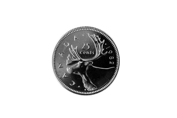 Old Canadian quarter on a white background stock photo