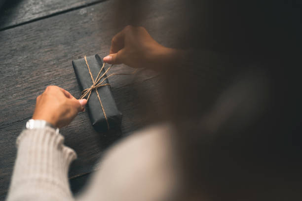 istock Swedish woman wrapping Christmas presents 1041353354