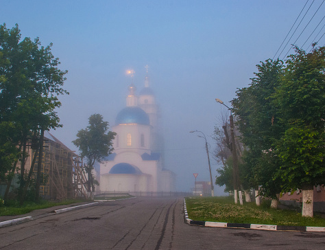 Orthodox church foggy morning road truck morning