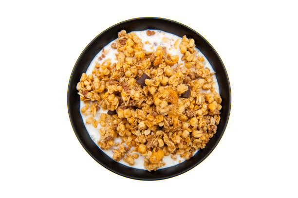 istock Muesli with chocolate and milk isolated on white background 1041368646