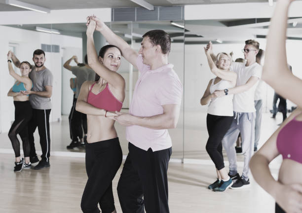 istock Positive dancing pair dance waltz  together 1041377070