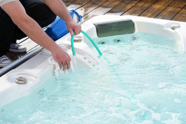 istock Hotel staff worker cleaning the pool 1041384288
