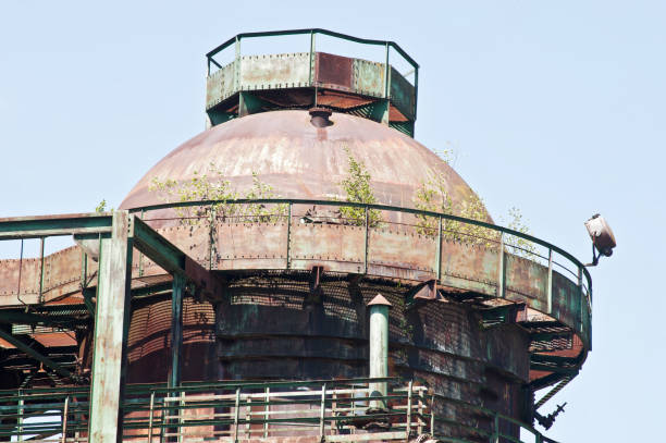 istock Old Rusty Tanks In A Decommissioned Factory 1041399740
