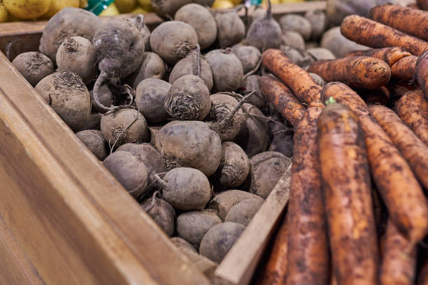 istock Beets and carrots at the store 1041407800