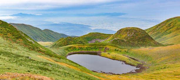 istock Chokai Pond and Gassan seen far away 1041414464
