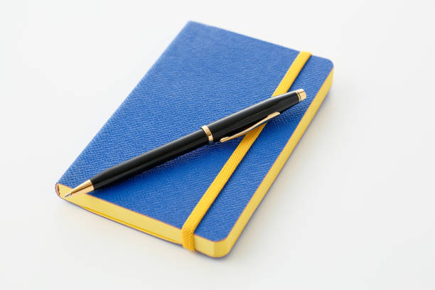 istock Colorful notebook and ballpoint pen 1041414560