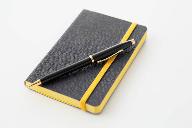 istock Colorful notebook and ballpoint pen 1041414632