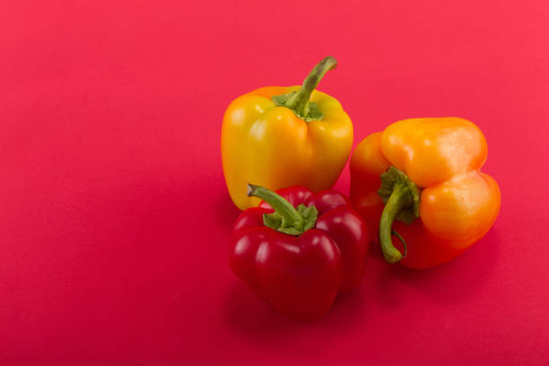 istock Sweet bellpepper on a colored background. Studio light. Top view 1041428806