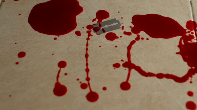 Blood dripping onto tile, attempt to commit suicide with sharp blade, depression