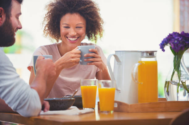 istock Happy couple having breakfast together. 1041439650