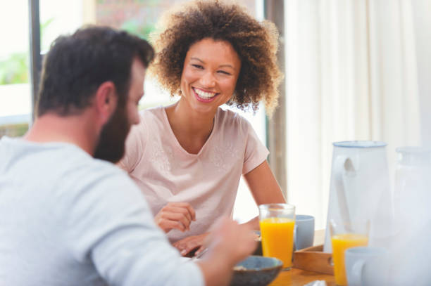 istock Happy couple having breakfast together. 1041439660