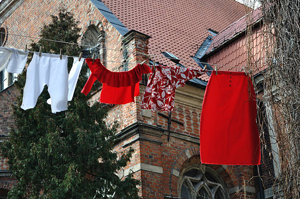 istock Clothesline and clothes are drying outside. Italian way. 104144252
