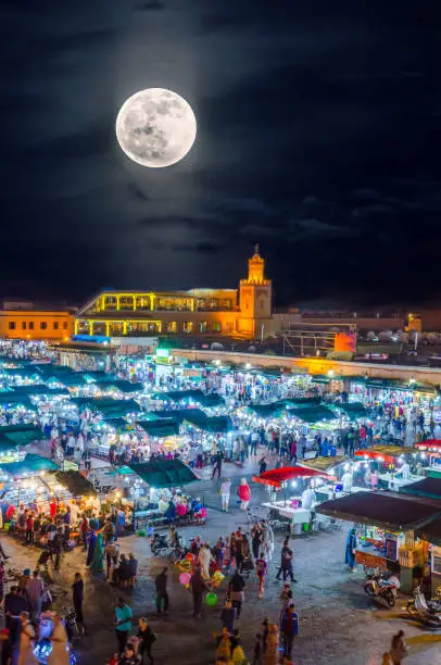 Photo of Jamaa el Fna market square in Marrakesh's medina, Marrakesh, Morocco, Africa