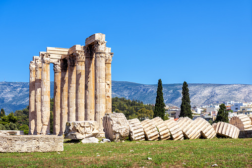 Temple of Olympian Zeus in Athens, Greece. The antique Temple of Zeus or Olympieion is one of the main landmarks of Athens. Panorama of the famous ancient Greek ruins in Athens center in summer.