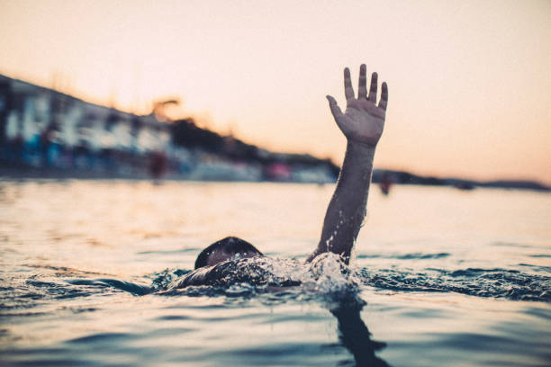 istock Drowning man in the water 1041460998