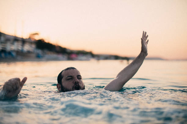 Drowning man Man drowning in the water drowning photos stock pictures, royalty-free photos & images
