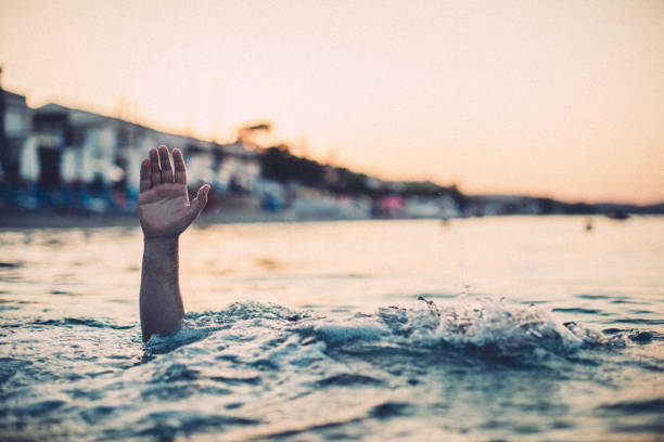 istock Drowning man in the sea 1041463818