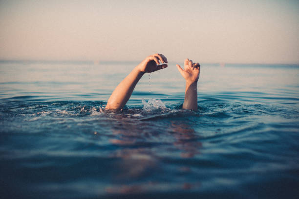 istock Drowning in the water 1041464226