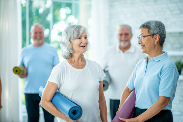 istock Women With Yoga Mats 1041469278