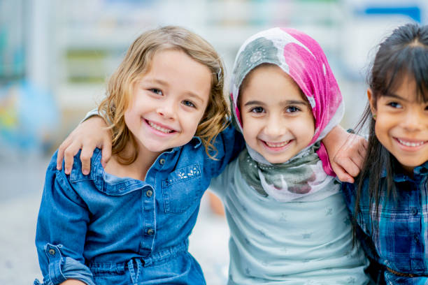 istock Ethnically diverse group of preschool friends 1041469654