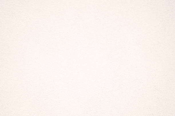 istock Pink white cement texture plastered stucco wall painted fade background. 1041470092