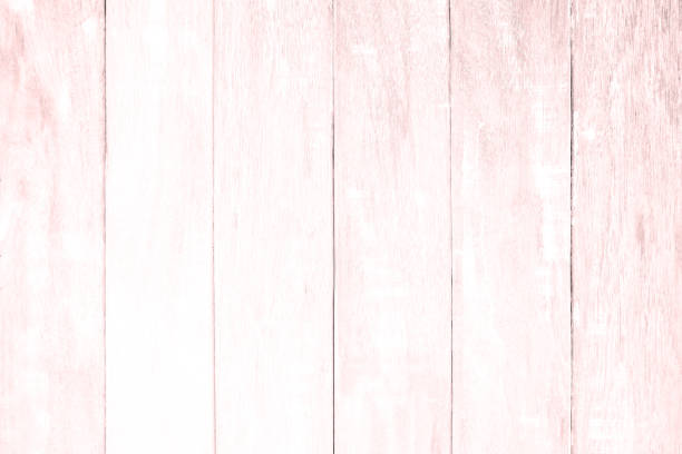 istock Pink wood floor texture background. plank pattern surface pastel painted wall; gray board grain tabletop above oak timber; tree desk,panel wooden dirty and cracked craft material dry sepia vintage. 1041470098