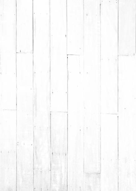 istock White plywood floor texture background. plank pattern surface pastel painted wall; gray board grain tabletop above oak timber; tree desk,panel wooden dirty and cracked craft material dry sepia vintage 1041470122