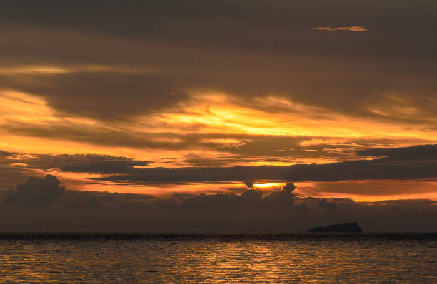 istock Landscape with sea and cloudy under the sky with sunset in the evening. 1041470310