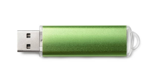 Top view of green USB flash drive Top view of green USB flash drive isolated on white usb stick photos stock pictures, royalty-free photos & images
