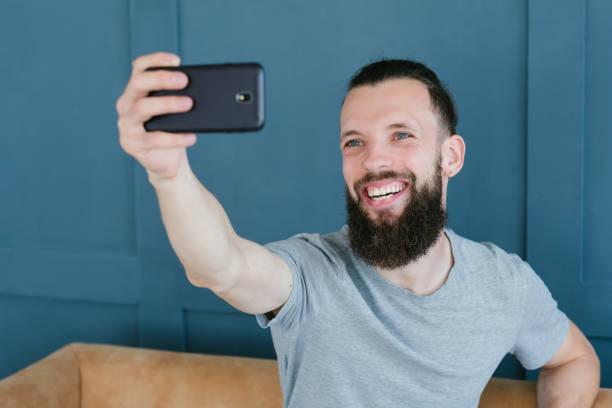 istock blogger streaming man communicating mobile phone 1041476066