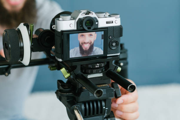 istock technology photo video shooting camera blogger man 1041476362