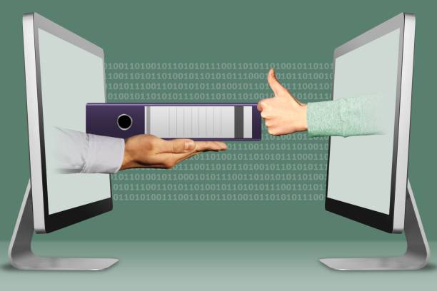 istock commerce concept, two hands from computers. folder and thumbs up, like. 3d illustration 1041477812