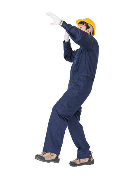 istock Workman with blue coveralls and hardhat in a uniform with clipping path 1041483362