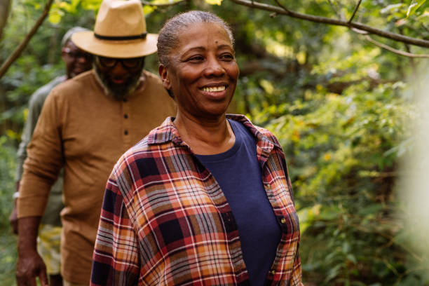 istock Seniors walking in the park 1041502390