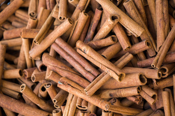 Stack of  of Cinnamon sticks in view as  background
